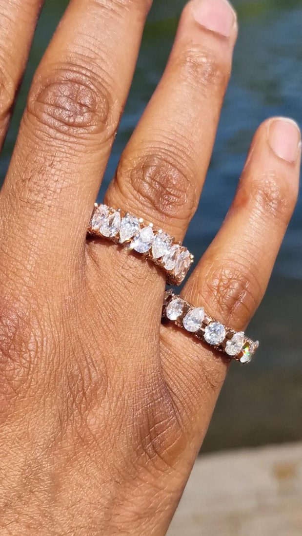 Pear eternity ring worn on the hand