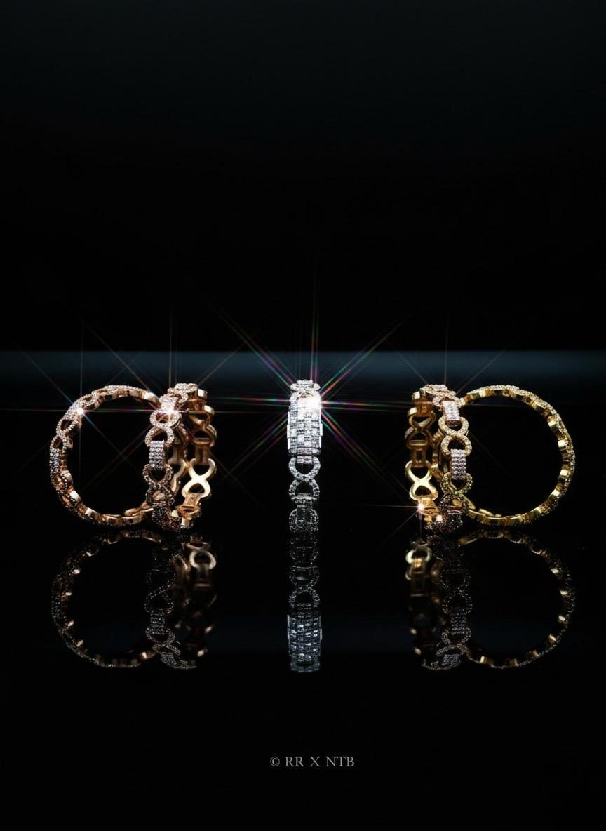 Diamond rings displayed on black